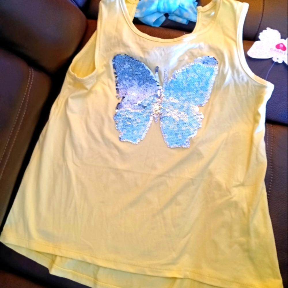 Between size 10 Tank Top